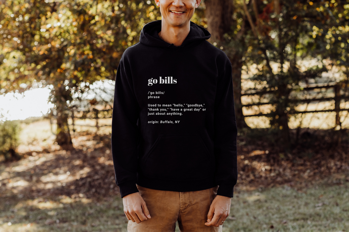 Go Bills definition hoodie in black paired with khakis.