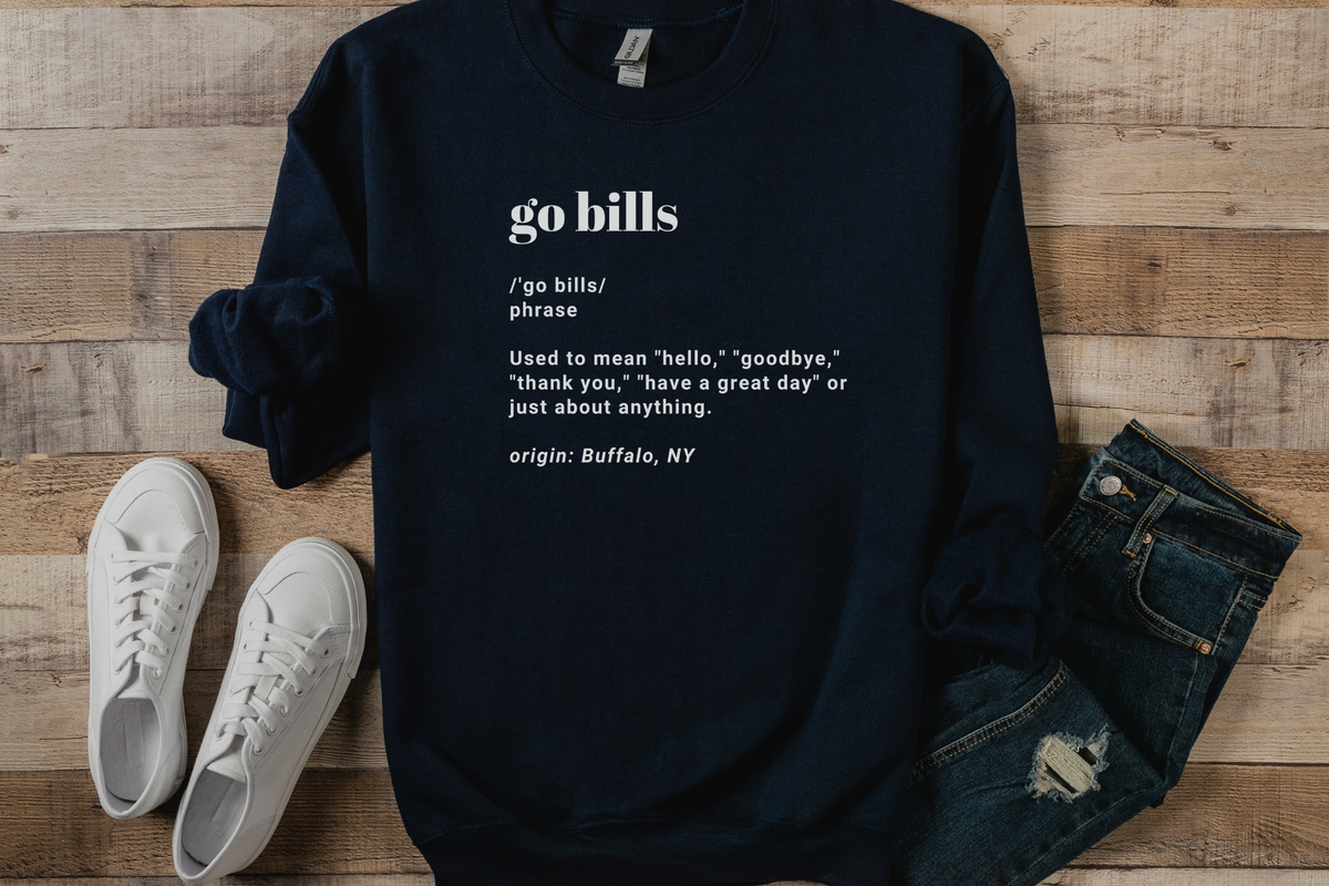Go Bills definition crew neck sweatshirt in navy blue paired with white sneakers and dark wash jeans.