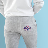 Back of Buffalo Bills football joggers paired with white high tops and a white sweatshirt.