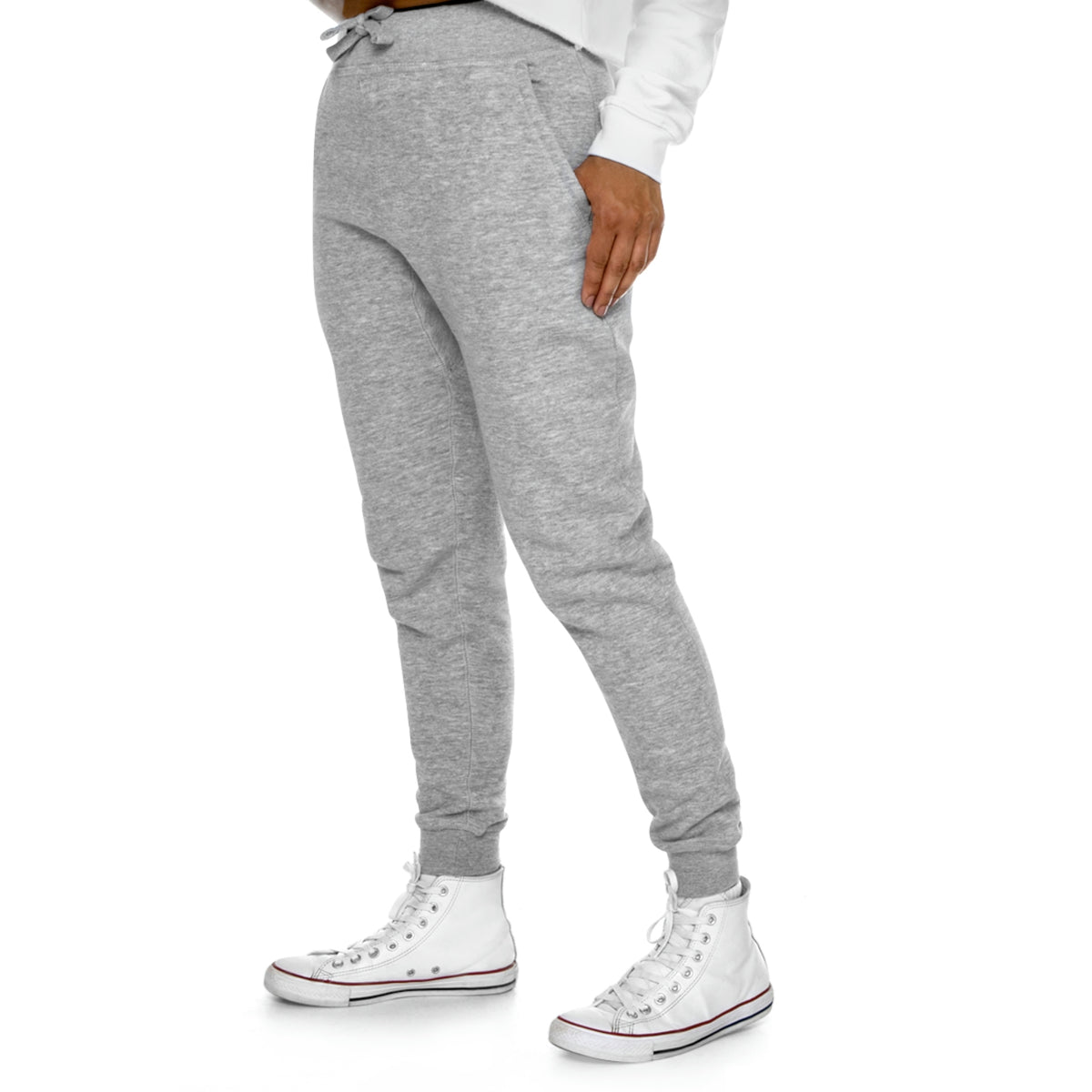 Buffalo Bills football joggers paired with white high tops and a white sweatshirt.