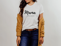 Mama graphic tee in white paired with a mustard yellow sweater and dark wash jeans.