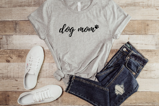 Dog mom shirt in ash paired with dark jeans and white sneakers.