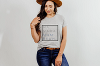 "Ma Bruh" t-shirt in ash paired with medium wash jeans, a tan hat and a Calvin Klein belt.